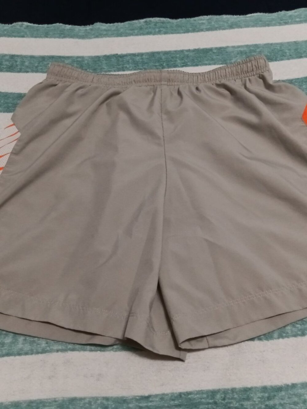 NIKE RUNNING SHORTS, SIZE "M", LIGHT GRAY w/ ORANGE ACCENTS (Pre-Owned)